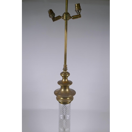 32 - A large brass and glass column table lamp, 97cm high