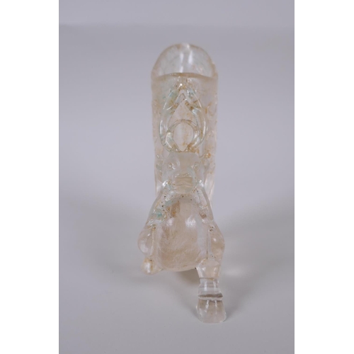 33 - A Chinese moulded glass libation cup in the form of a mythical deer, 14cm high