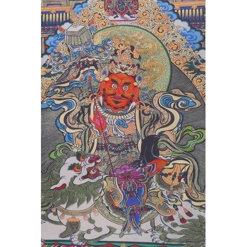 34 - A Tibetan printed thangka depicting a wrathful deity, 66 x 89cm