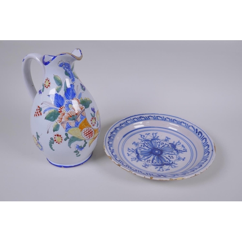 38 - A late C18th/early C19th Delft tin glazed blue and white pottery bowl with floral decoration, and a ... 