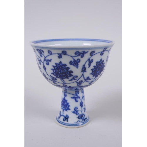 40 - A blue and white porcelain stem cup with scrolling lotus flower decoration, Chinese Xuande 6 charact... 