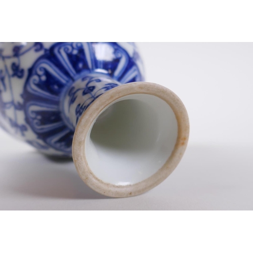 40 - A blue and white porcelain stem cup with scrolling lotus flower decoration, Chinese Xuande 6 charact... 