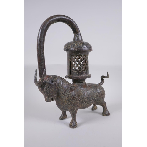 49 - A Sino Tibetan bronze lantern in the form of a bull, 37cm high