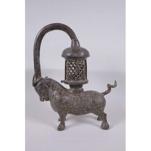 49 - A Sino Tibetan bronze lantern in the form of a bull, 37cm high