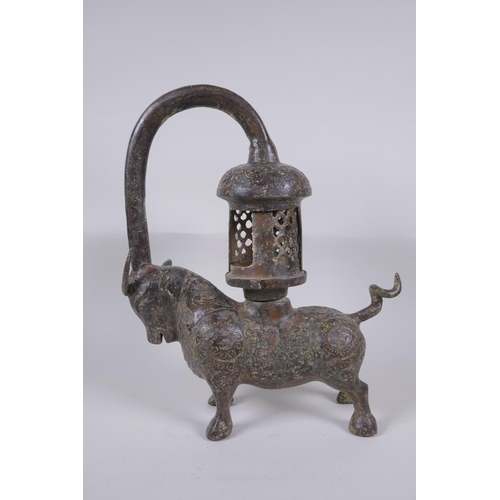 49 - A Sino Tibetan bronze lantern in the form of a bull, 37cm high