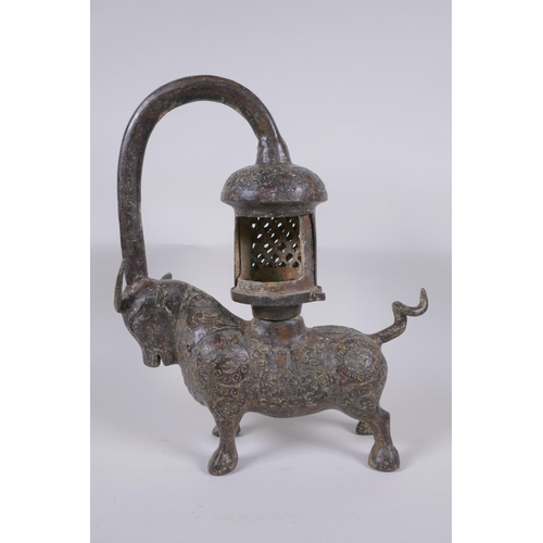 49 - A Sino Tibetan bronze lantern in the form of a bull, 37cm high