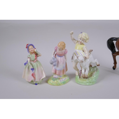 54 - A collection of Royal Doulton porcelain figures to include Biddy Pennyfarthing, HN1843, Collinette, ... 