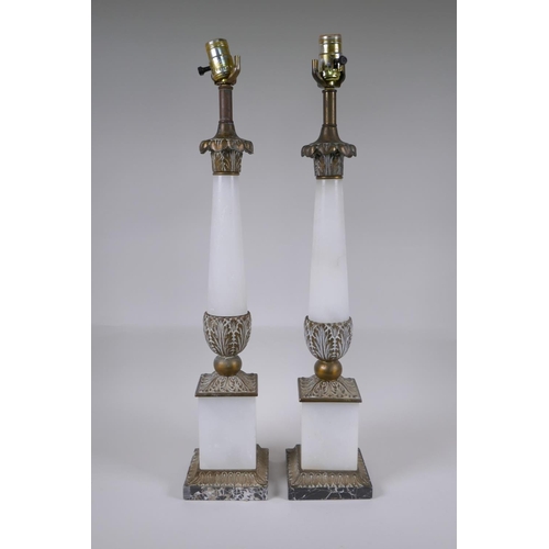 57 - A pair of bronze and alabaster table lamps, 66cm high