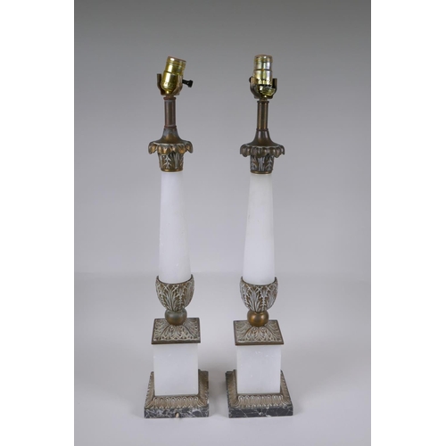 57 - A pair of bronze and alabaster table lamps, 66cm high