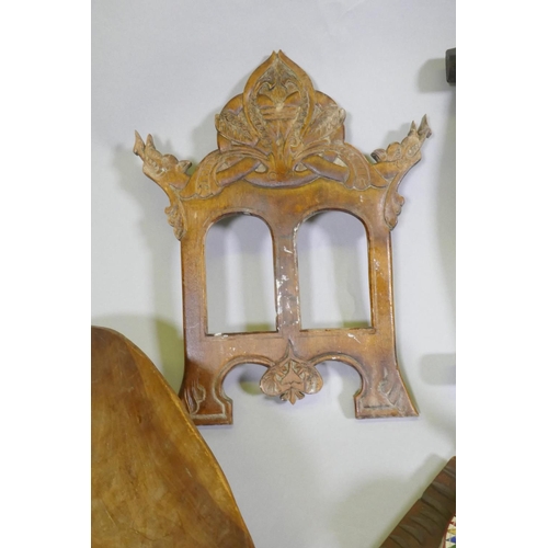 66 - A carved wood bookslide, photo frame, tray and treen, a carved brazil nut husk etc, slide 30 x 13cm