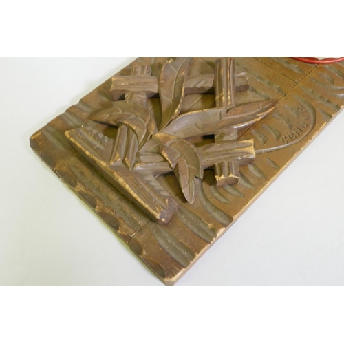 66 - A carved wood bookslide, photo frame, tray and treen, a carved brazil nut husk etc, slide 30 x 13cm