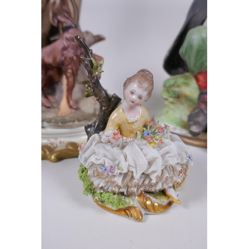 76 - Three Capodimonte porcelain figures including a pair of ring holders in the form of seated flower gi... 