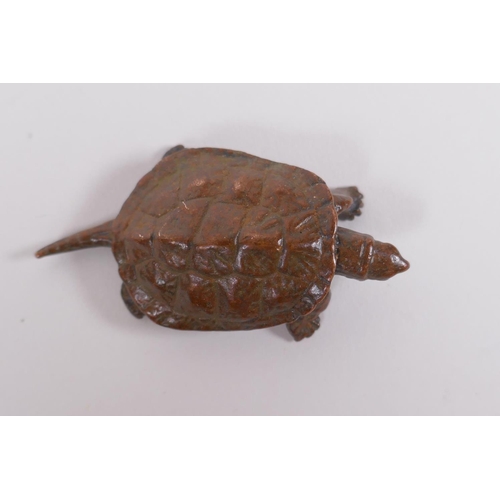 90 - A Japanese style bronze okimono tortoise, impressed mark to base, 6cm long