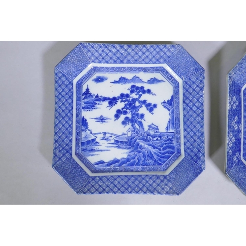 93 - A pair of oriental transfer printed blue and white decorated dishes, 26 x 26cm, and a pair of armori... 