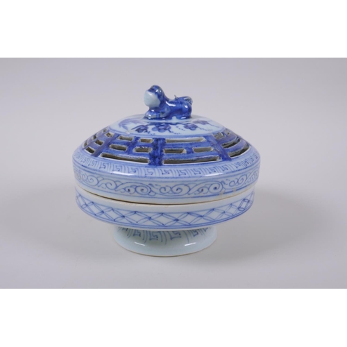 95 - A Chinese blue and white porcelain cylinder censer and cover with raised foot and kylin knop, 16cm d... 