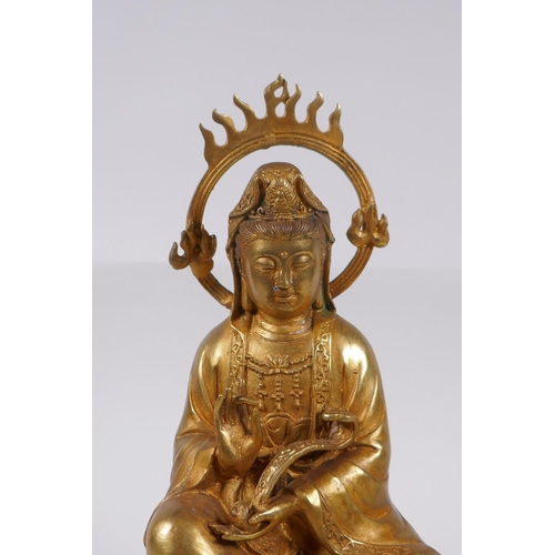 98 - A Chinese gilt bronze figure of Quan Yin, 30cm high