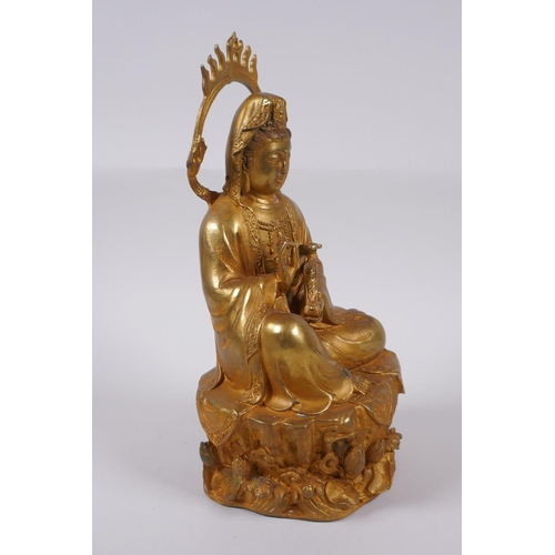 98 - A Chinese gilt bronze figure of Quan Yin, 30cm high