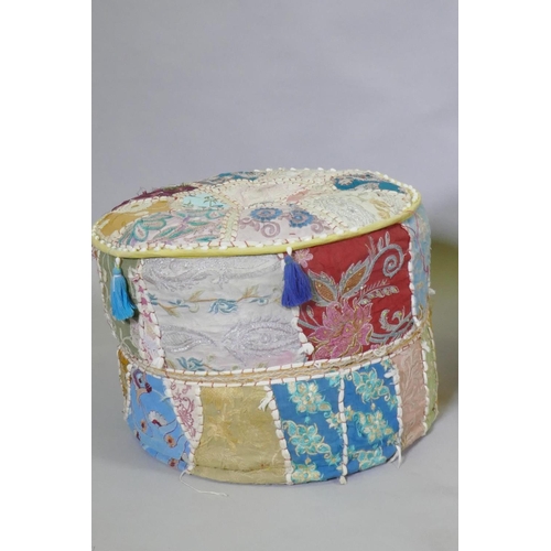 1134 - A North African leather patchwork pouffe, 60cm diameter x 35cm high, and another with Indian embroid... 