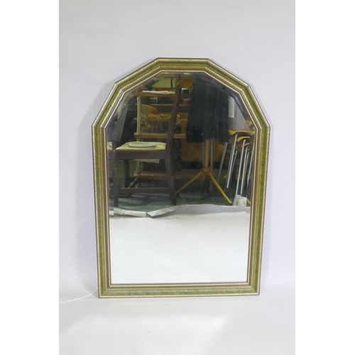 1152 - An over mantel bevelled glass mirror, 71 x 101cm