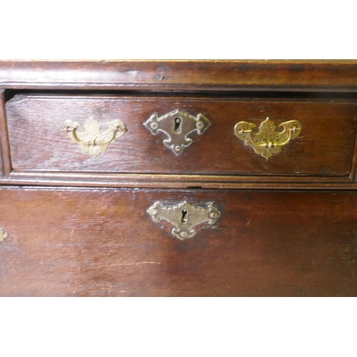 1140 - An early C18th oak chest of three over three drawers, with scratched and moulded detail on the rails... 