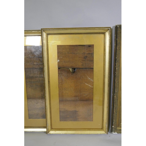 911 - Two pairs of gilt composition picture frames, rebates 60 x 40cm and 38 x 68cm