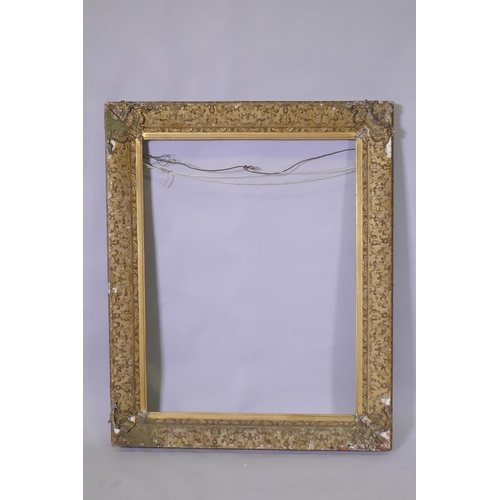 906 - A C19th giltwood and composition picture frame, AF, rebate 71 x 92cm