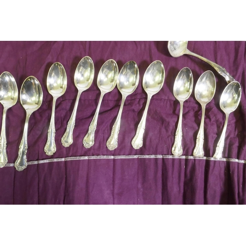 641 - A Mappin & Webb twelve place part cutlery service, a pair of toast racks with Royal cypher, Cohr... 