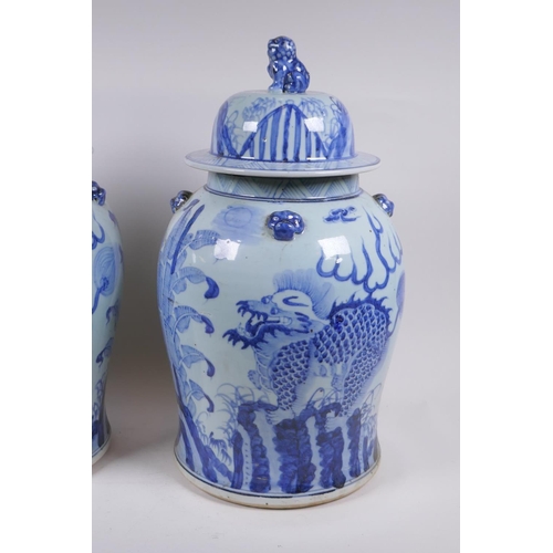 347 - A pair of Chinese blue and white porcelain jars and covers with lion mask, kylin and Fo-dog decorati... 