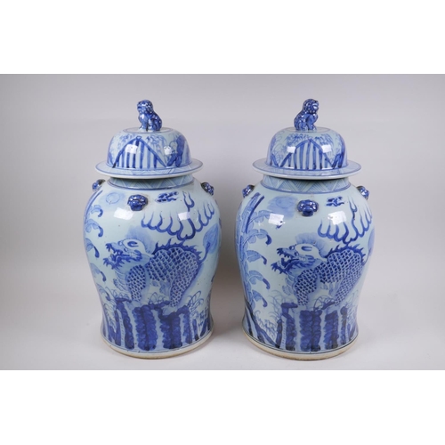 347 - A pair of Chinese blue and white porcelain jars and covers with lion mask, kylin and Fo-dog decorati... 