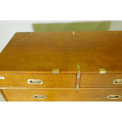 1001 - A fine late C19th/early C20th golden oak secretaire campaign style chest of two sections, the upper ... 