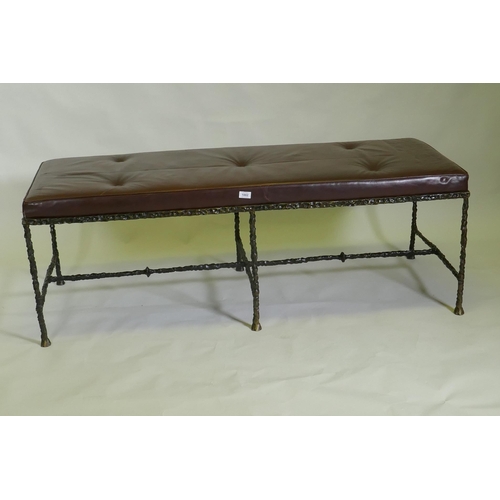 1002 - A contemporary bronze based leather hall settle, 150 x 60cm, 50cm high