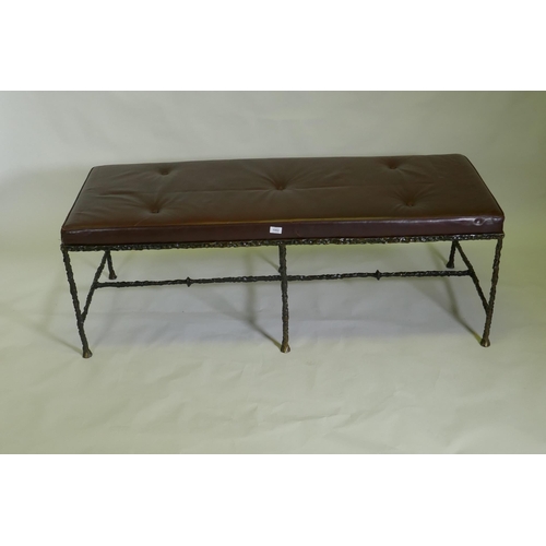 1002 - A contemporary bronze based leather hall settle, 150 x 60cm, 50cm high