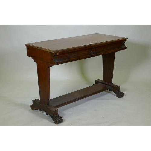 1006 - C19th mahogany writing table with two moulded frieze drawers, raised on end supports united by a str... 