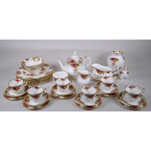 101 - A Royal Albert Old Country Rose six place setting part dinner and tea service, comprising teapot, su... 