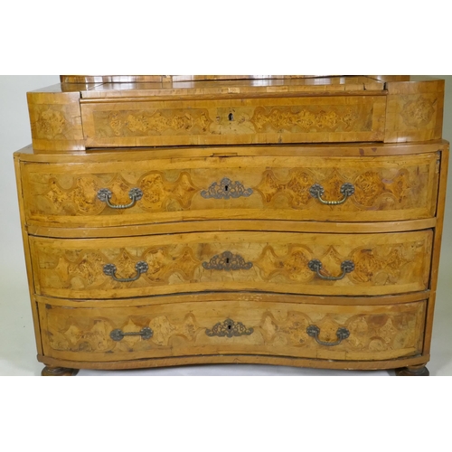 1012 - An C18th/C19th Continental walnut secretaire a trois corps, inlaid with burr walnut panels, the top ... 