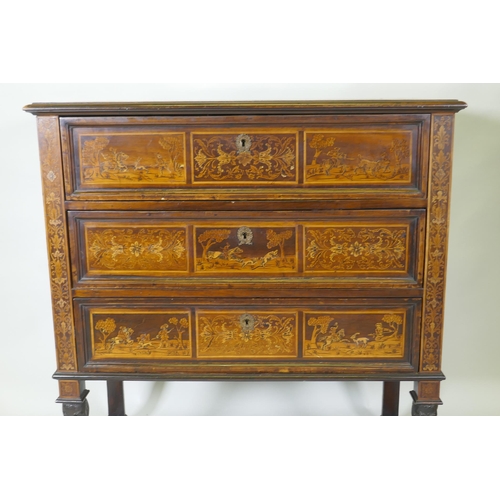 1018 - C18th/C19th Italian/Swiss marquetry inlaid walnut chest of three drawers, inlaid with hunting scenes... 