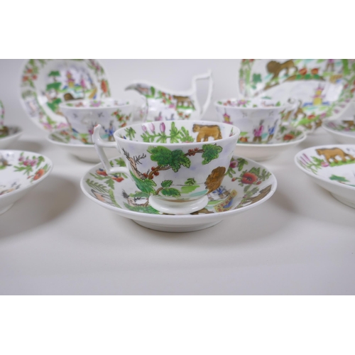 102 - A late C18th/early C19th porcelain part tea service comprising five cups, eight saucers, milk jug an... 