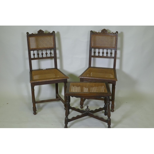 1036 - A pair of C19th French oak side chairs with cane seats and backs, and a stool