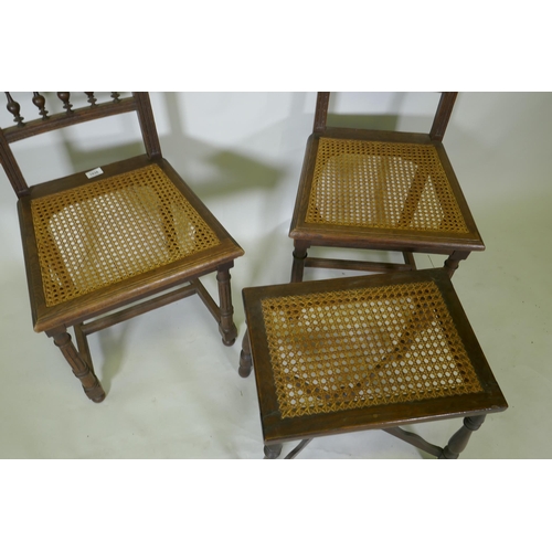 1036 - A pair of C19th French oak side chairs with cane seats and backs, and a stool