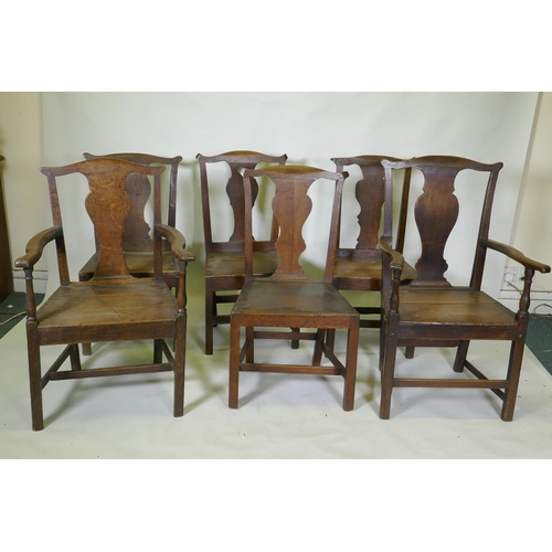 1039 - A set of six (4+2) provincial elm Chippendale style dining chairs with pegged joints and blacksmith ... 