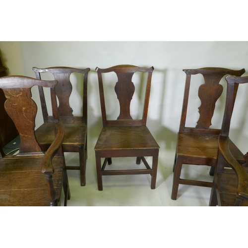 1039 - A set of six (4+2) provincial elm Chippendale style dining chairs with pegged joints and blacksmith ... 