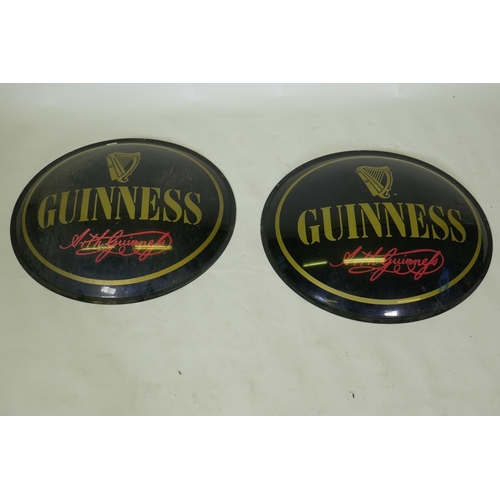 1044 - Two perspex Guinness advertising signs, 67cm diameter