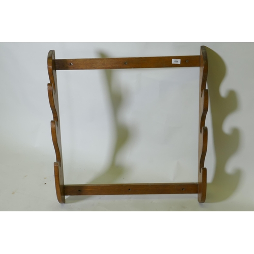 1056 - A vintage oak gun rack, 72 x 77 x 14cm