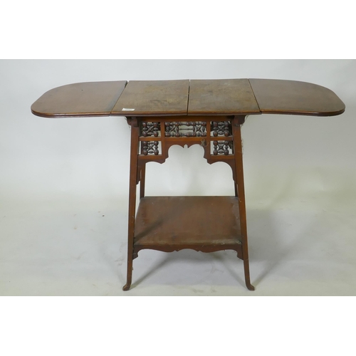 1060 - A C19th walnut Arts & Crafts Moorish style drop leaf occasional table, raised on splay supports,... 