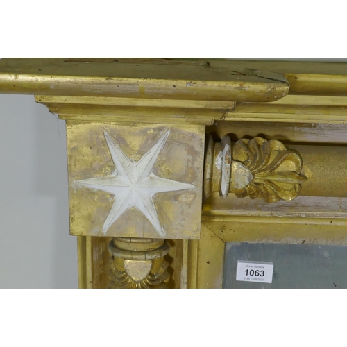 1063 - A Regency giltwood and composition over mantel mirror with anthemion decoration and original glass p... 