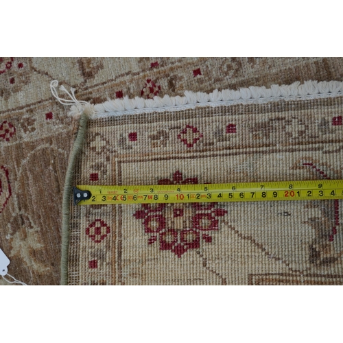 1074 - A cream ground wool Ziegler Mahal runner decorated with floral medallions, 85 x 350cm