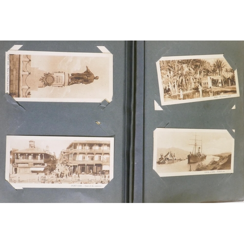 108 - Postcard album, C19th scenes of the orient, Jerusalem, Jaffa, Suez, WWI battle scenes and an album o... 