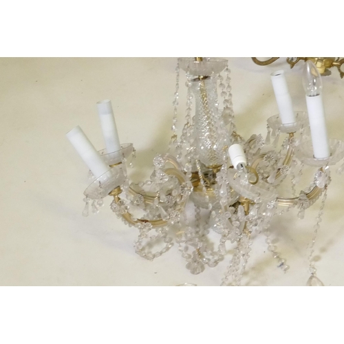 1080 - Four five branch brass chadeliers, 35cm high, and three, five and six branch crystal glass chandelie... 