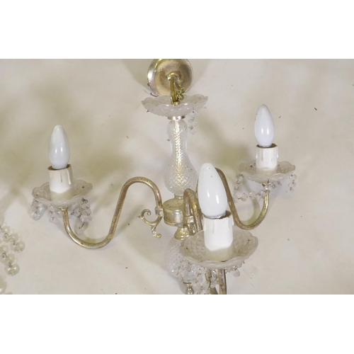 1080 - Four five branch brass chadeliers, 35cm high, and three, five and six branch crystal glass chandelie... 