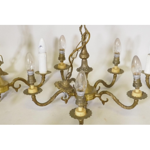 1080 - Four five branch brass chadeliers, 35cm high, and three, five and six branch crystal glass chandelie... 